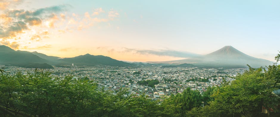 Mount Fuji Retreats scenic mountain landscape with lush greenery and distant peak